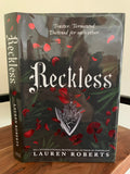 Reckless with red sprayed edges
